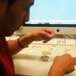 Alex assembling wires from the "Digg it" button
